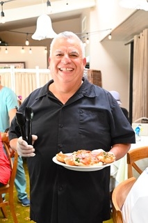 Professional chefs at The Oaks of Pasadena independent senior living community cooking nutritious and flavorful meals for residents in the on-site kitchen.