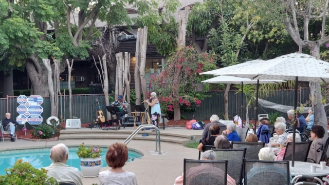 Our summertime Music by the Pool events feature popular tunes, wine and hors d'oeuvres