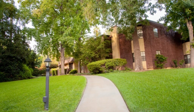 Senior living apartments at The Oaks of Pasadena are either first or second floor, featuring lush garden and arboretum views
