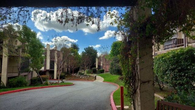 The Oaks of Pasadena front driveway leads to our underground parking garage