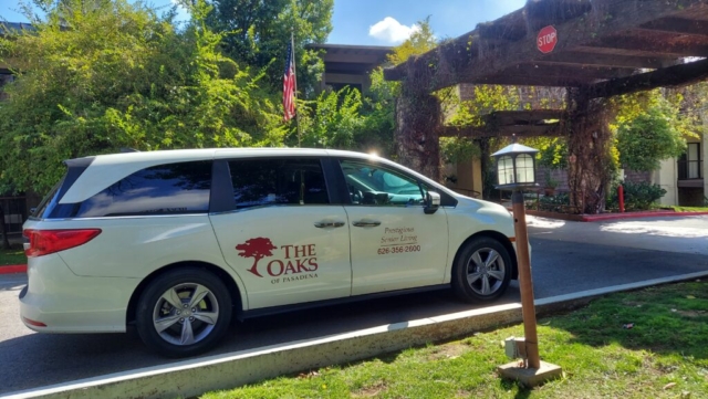 The Oaks of Pasadena white Honda minivan is one of the vehicles providing free shuttle service for our residents