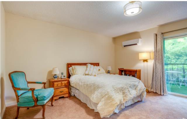 Studio apartment at The Oaks of Pasadena senior living community featuring a private balcony or patio for outdoor relaxation
